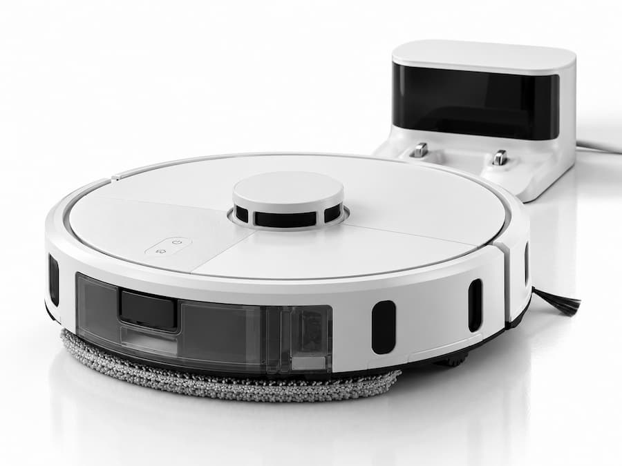 Roomba 115 Combo Blanco regresando automáticamente a su base de carga