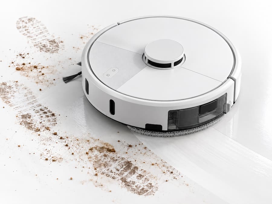 Roomba 115 Combo Blanco utilizando SmartScrub para fregar una zona del suelo
